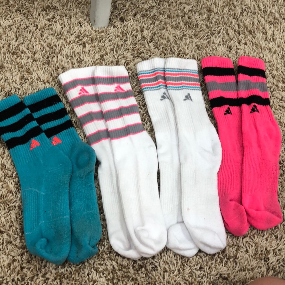 Four pair of colorful Adidas socks